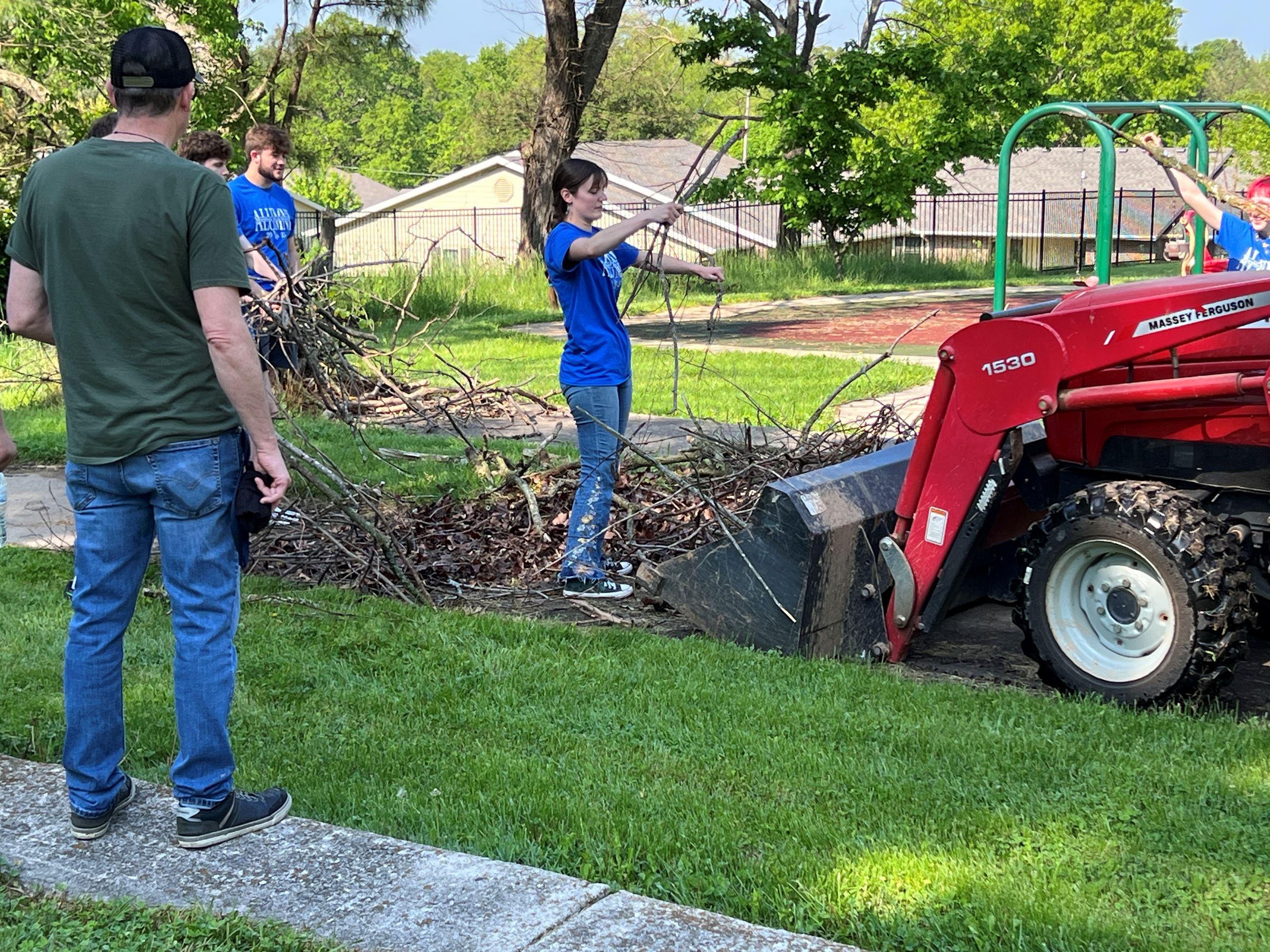 Eric Yarnell, students, limbs, tractor
